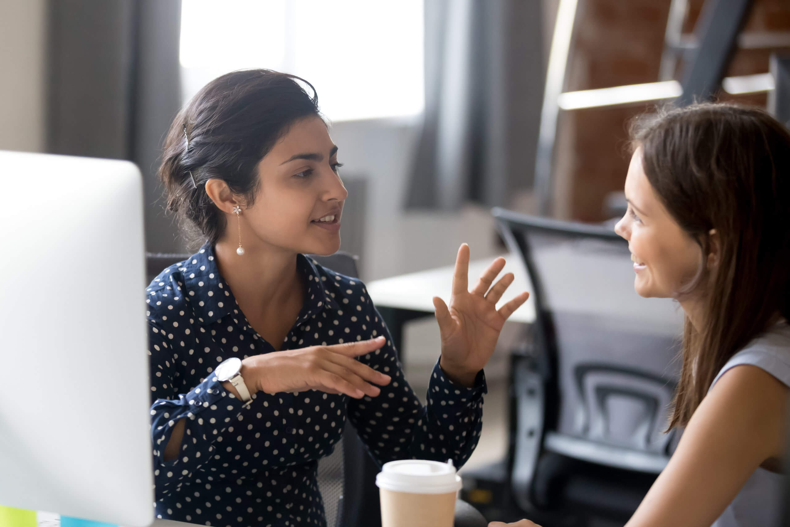 Two women communicating